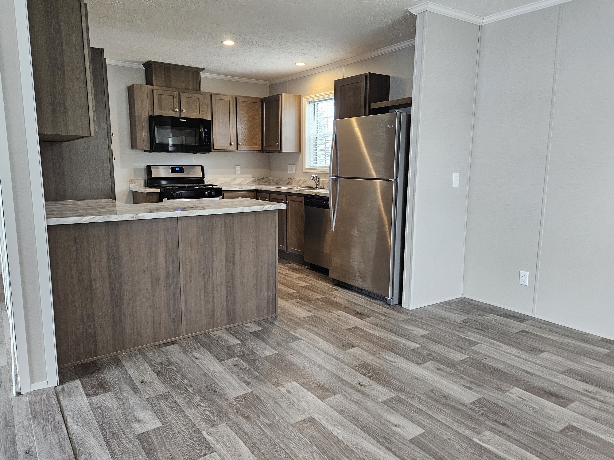 Modern Living at its Best - double wide - in Clay Township, MI - photo 1 of 11