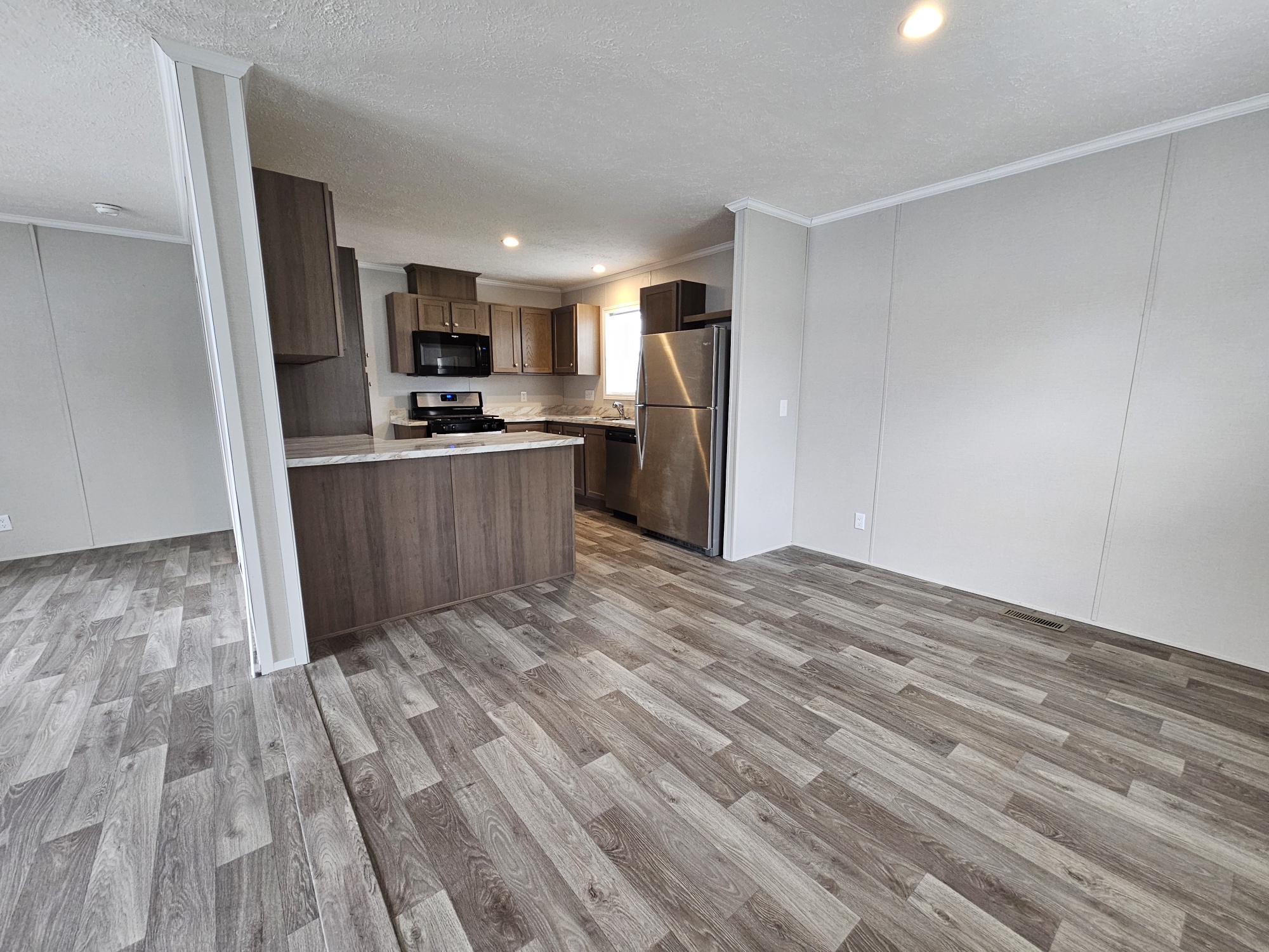 Modern Living at its Best - double wide - in Clay Township, MI - photo 2 of 11