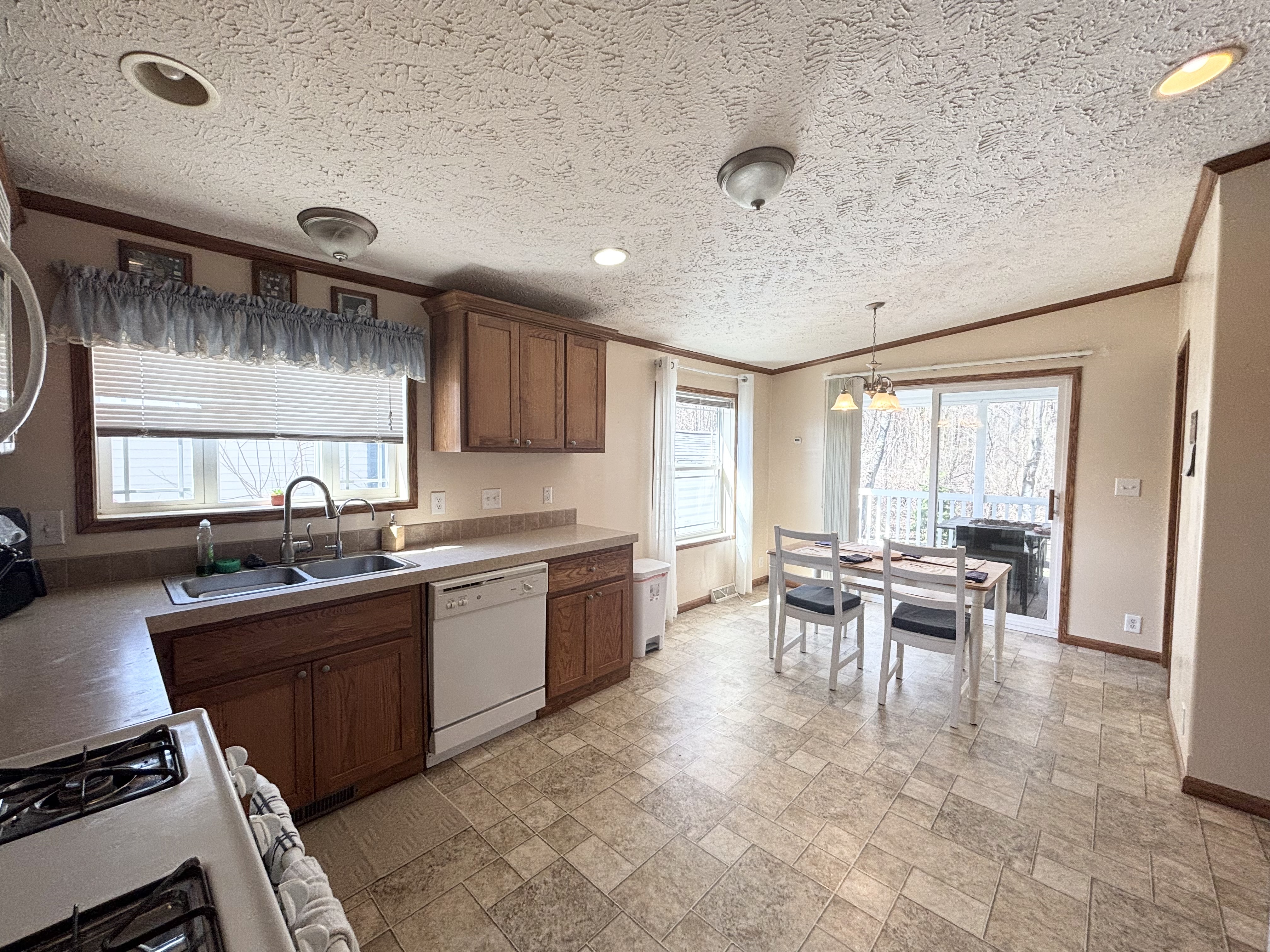 MUST-SEE PORCH MODEL! - double wide - in Whittaker, MI - photo 2 of 11