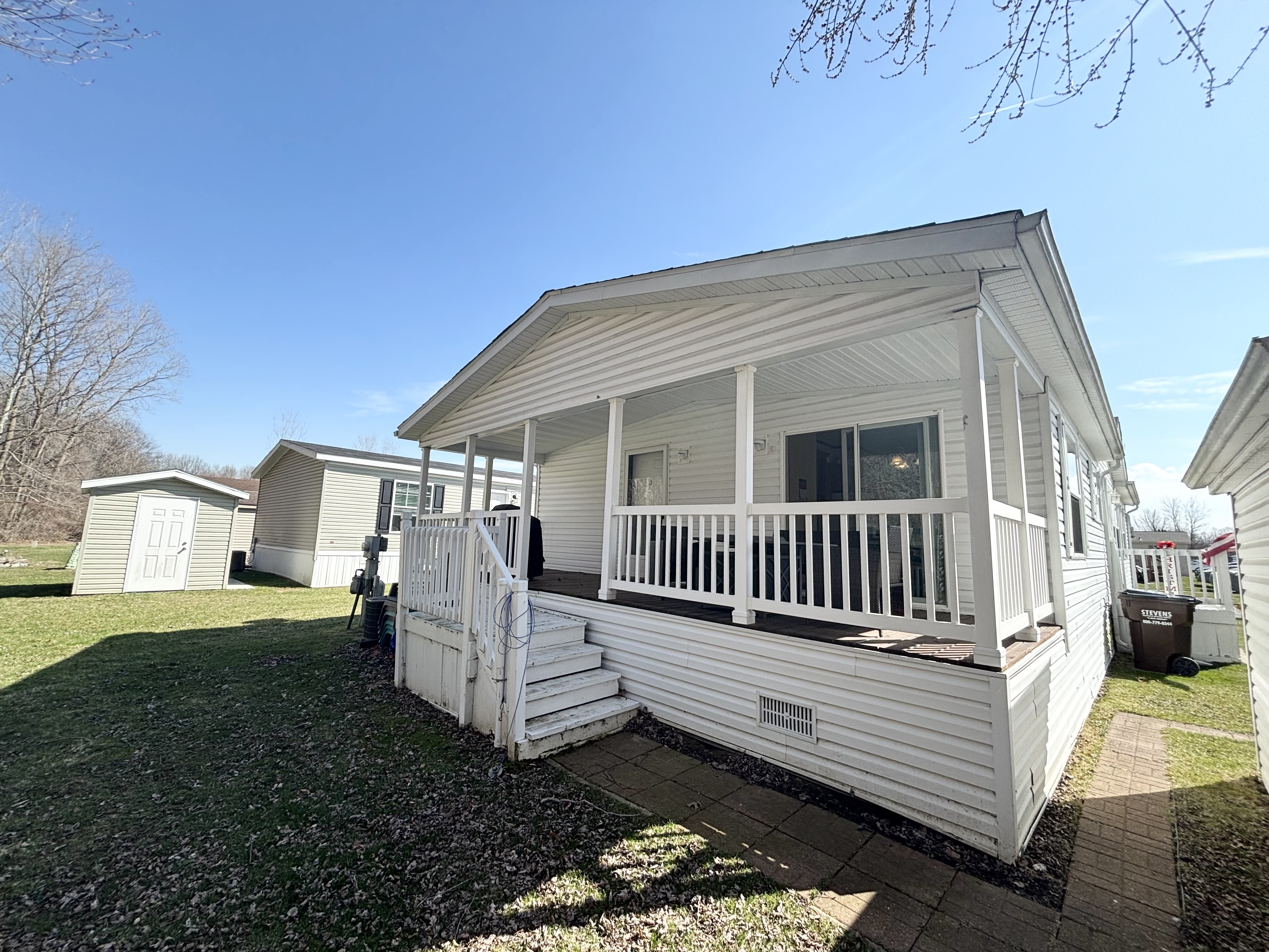 MUST-SEE PORCH MODEL! - double wide - in Whittaker, MI - photo 10 of 11