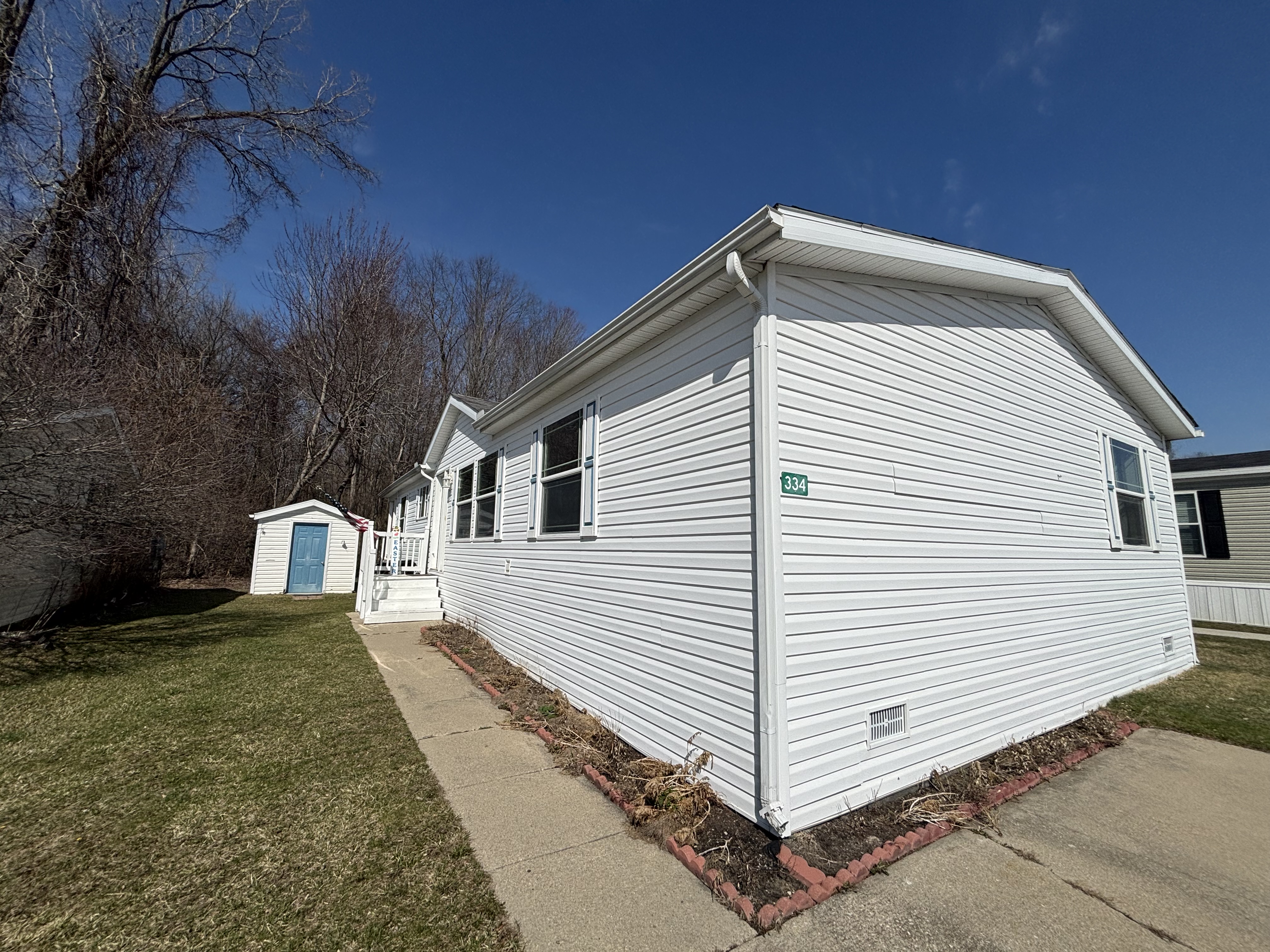 MUST-SEE PORCH MODEL! - double wide - in Whittaker, MI - photo 11 of 11