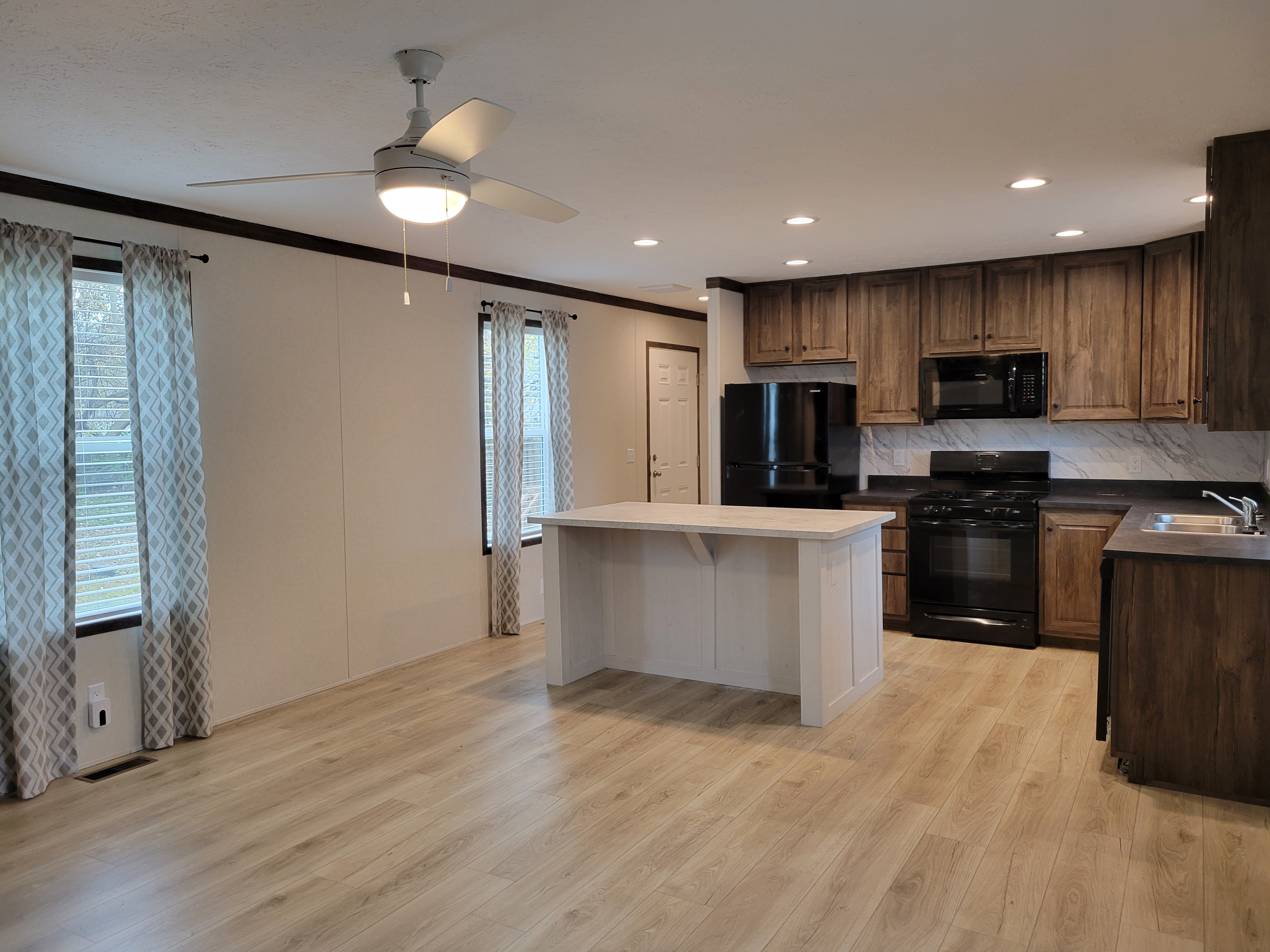 Country Setting with Open Floor Plan - single wide - in Clay Township, MI - photo 2 of 16
