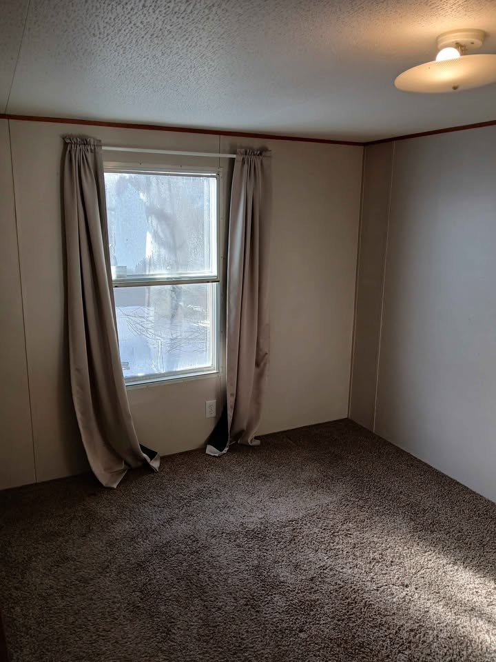 3BE / 1BA Home for Rent | Lot #12 - double wide - in Roseau, MN - photo 3 of 8