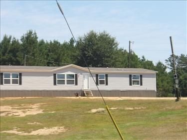 209 Van Holmes Road, Tylertown, MS 39667 - triple wide - in Tylertown, MS