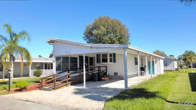 1997 Homes Of Merit Double Wide - double wide - in Kissimmee, FL - photo 1 of 4