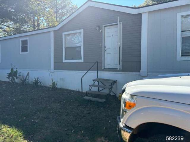 1999 Redman Double Wide - double wide - in Texarkana, TX - photo 1 of 2