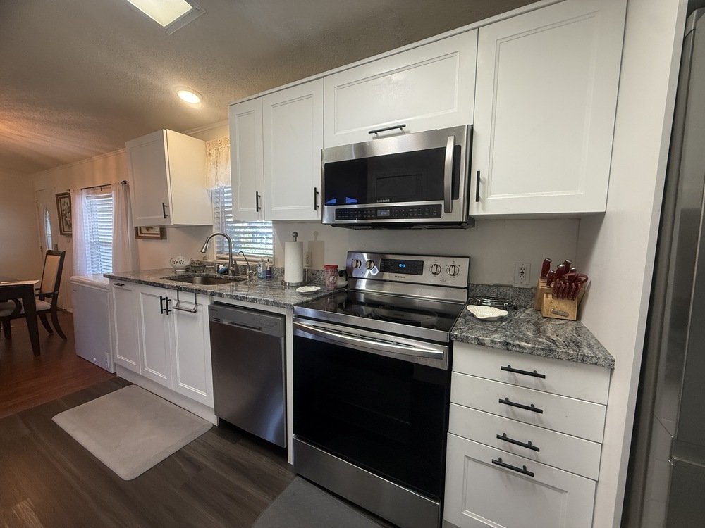 1999 Skyl Mobile Home for Sale - double wide - in Auburndale, FL - photo 3 of 12