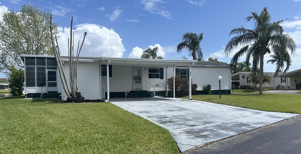 1995 Homes Of Merit Mobile Home for Sale - double wide - in Merritt Island, FL - photo 2 of 12