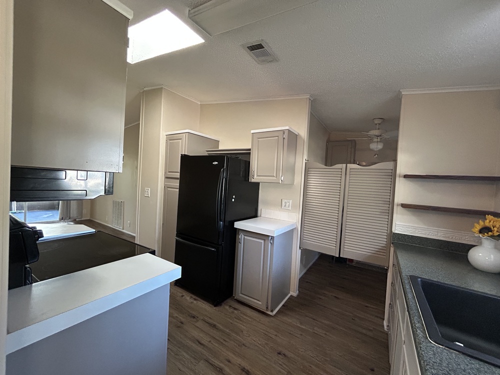 1994 Homes Of Merit Mobile Home for Sale - double wide - in Merritt Island, FL - photo 4 of 12
