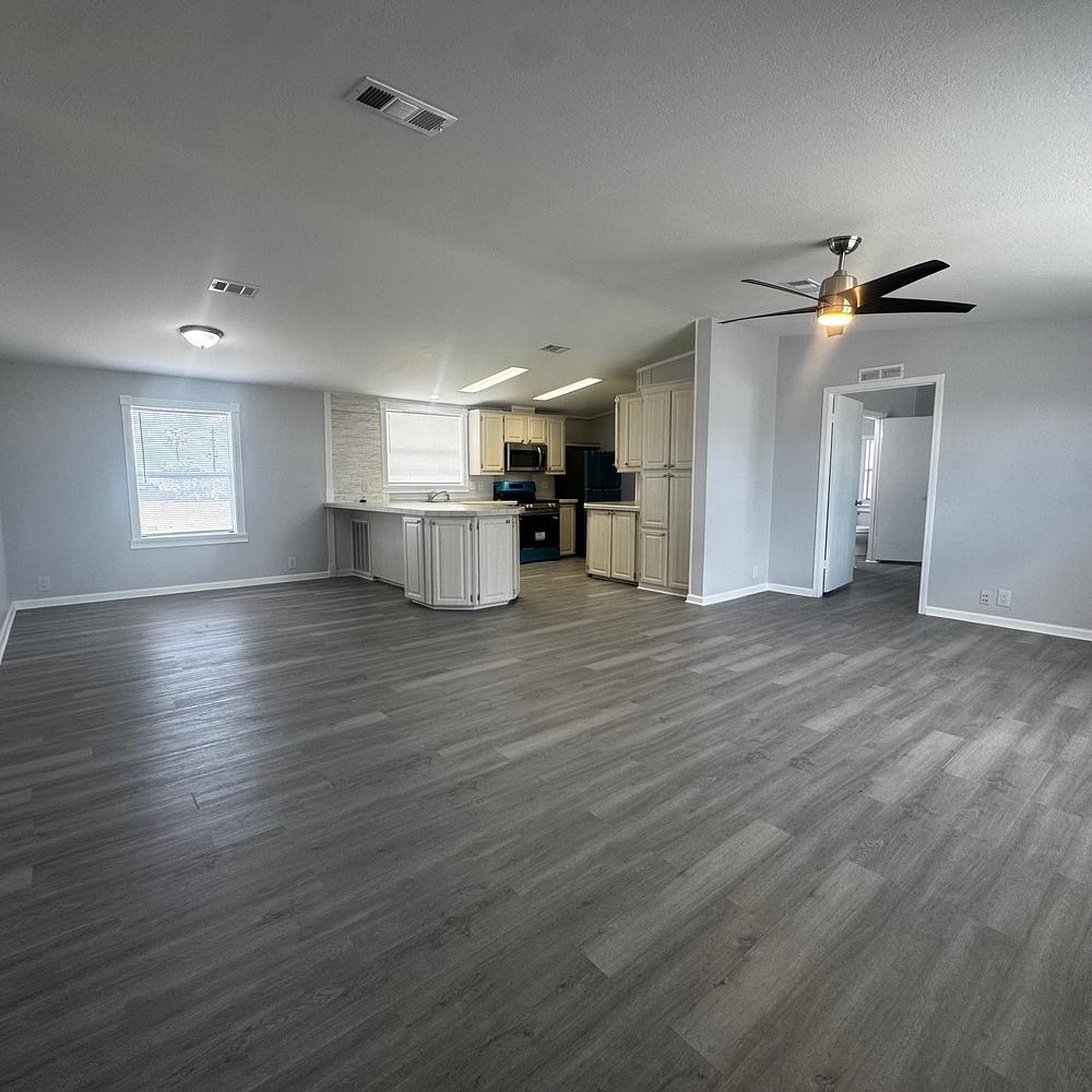 2004 Homes Of Merit Mobile Home for Sale - double wide - in Davenport, FL - photo 2 of 12